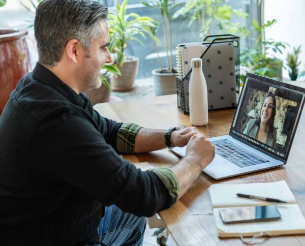 Graphic Designer Selling Logos through a Zoom video call